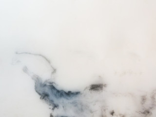 Marble texture, The smooth polished white marble surface has a black pattern of stone on the background.