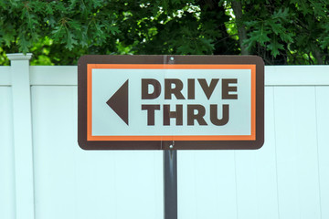 Fototapeta premium Drive Thru informational sign on a parking 