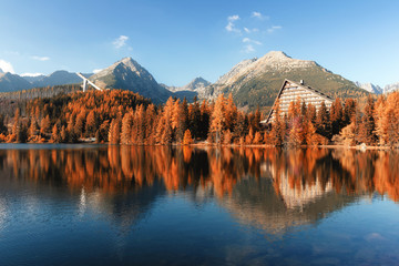 Fototapeta premium Mountain lake Strbske pleso (Strbske lake) in autumn time. High Tatras national park, Slovakia