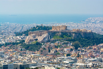 Athens in spring, view from hill,  cityscape with streets and buildings, ancient urbal culture