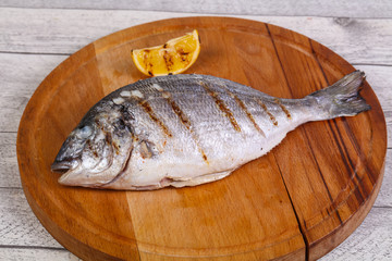 Grilled dorada with lemon