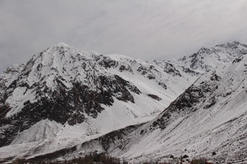 beautiful high snowy mountains in the Andes mountain range of Chile. Place located in Cajón del Maipo, Chile.