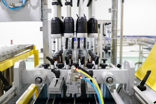 Close up Beverage bottle sorting machine - Powered by Adobe