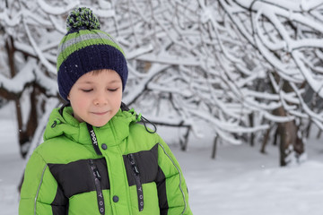 Portrait of boy in winter time