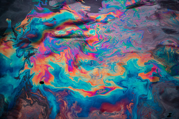 rainbow reflection on water surface