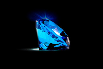 Beautiful blue diamond at isolated black background