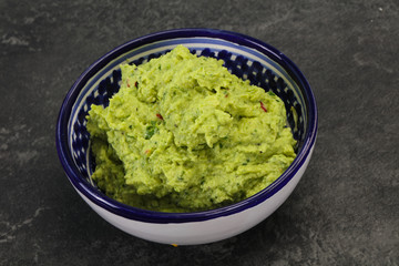Avocado guacamole sauce with chili pepper