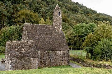 Monastery cemetery of Glendalough, Ireland. Famous ancient monastery in the wicklow mountains with a beautiful graveyard from 11th century