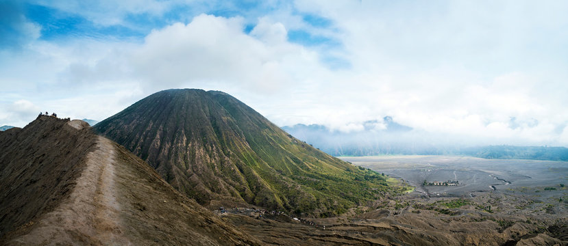 Mount Bromo and the sea of sand panoramic view from the crater, East Java, Indonesia