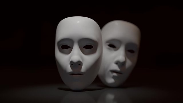 Theater masks on black background.
