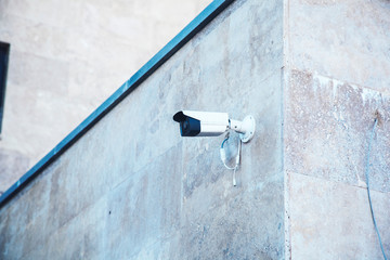 video camera in the street wall