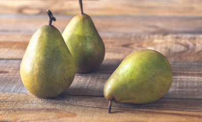 Pears on the wooden background