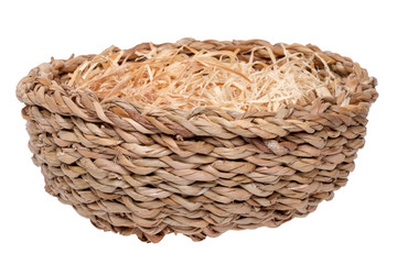 Empty basket. Close-up of a empty basket filled with decorative straw isolated on a white background. For your food and product display montage. Macro.