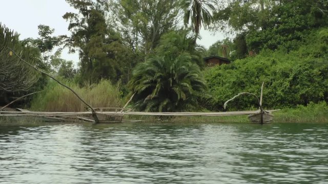 View of some old fisherman boats from a boat trip on lake Kivu during Rwanda travel in Africa