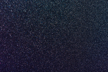 shimmering background with little sparkles, dark glittering texture