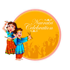 Obraz na płótnie Canvas Couple performing Garba dance in Dandiya Raas for Dussehra or Navratri in vector