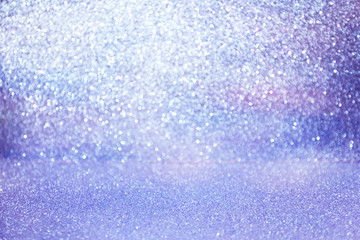 pastel purple glittering Christmas lights. Blurred abstract holiday background