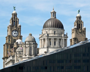 Obraz premium A View of the Royal Liver and Port of Liverpool Buildings Rising Above a Mann Island Building, England, GB, UK