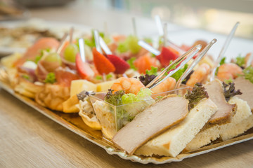 sandwiches and canapés with fish and meat