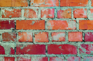 Obraz premium Red brick brick wall. Sloppy rough masonry. Front view.