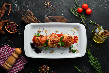 Baked chicken legs with cheese and sauce. Dishes, food. Top view. Free space for your text.