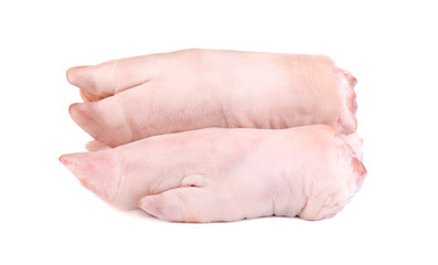 Raw pork legs, isolated on a white background. Fresh pig hooves.