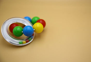 Children's toy in a yellow background