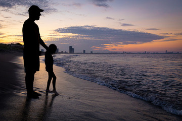 Father and son beach sunset