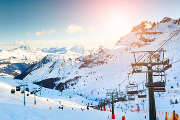 Ski resort in winter Dolomite Alps. Val Di Fassa, Italy. Beautiful mountains and the blue sky,...