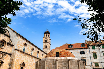 Fototapeta na wymiar St. Saviour Church in dubrovnik with a fontaine in front