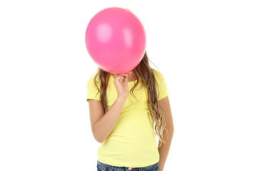 Pretty little girl with pink balloon on white background