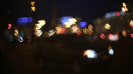Fototapeta na wymiar blurry artistic diaphragm evening city
