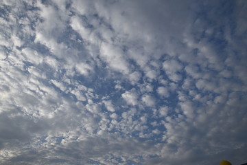 formation of cloud in the sky during the sunny day