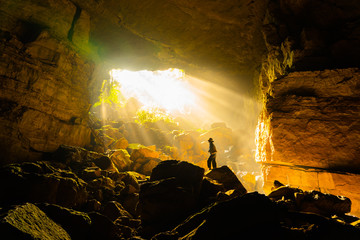 Fototapeta na wymiar The morning light shining inside Pha Phueng Cave, Thailand