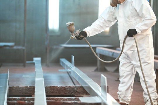 Industrial Painter In Chamber Painting Metal Detail