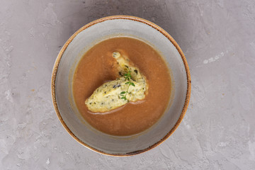 Porcini soup with pumpkin seed dumplings