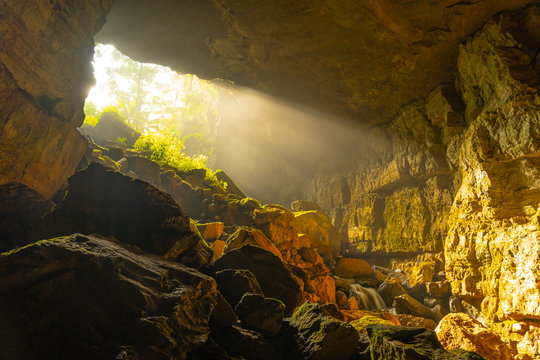 The morning light shining inside Pha Phueng Cave, Thailand