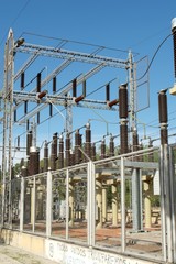 High voltage electrical transformers at a power station.