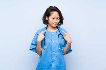 Surgeon doctor woman with surprise facial expression