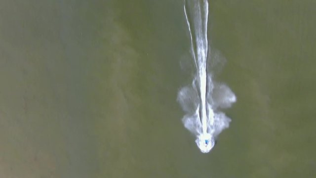 Aerial overhead tracking shot of a jetski in Raystown lake, Pennsylvania.