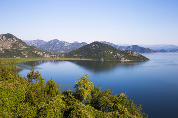 Naklejka na ściany i meble View of the summer seascape Montenegro in Balkans. Mountains,sea and islands.