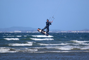 Kitesurfer riding off Barassie Beach, Troon