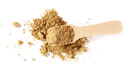 Ginger powder in wooden spoon isolated on white background,  Zingiber officinale