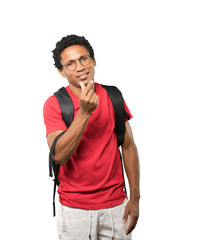 Young man making a gesture of worried about his economy