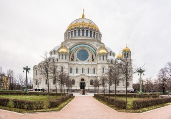Fototapeta na wymiar The Naval cathedral of Saint Nicholas in cloudy autumn day. Kronstadt, Russia.