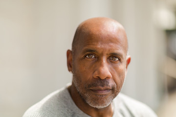 African American man with a concerned look.