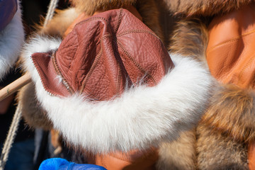 Medieval style leather cap with white fur rim