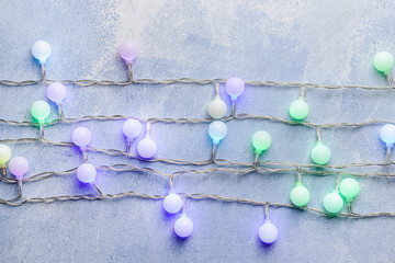 Obraz premium Christmas lights on color background