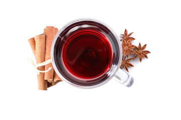 Glass of tasty mulled wine isolated on white background, top view