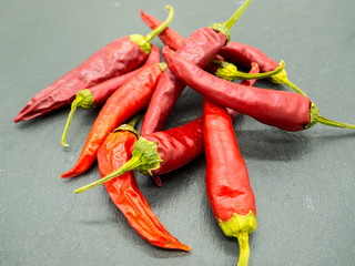 hot red peppers on slate